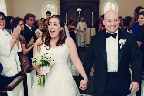 Newlyweds walking down the aisle