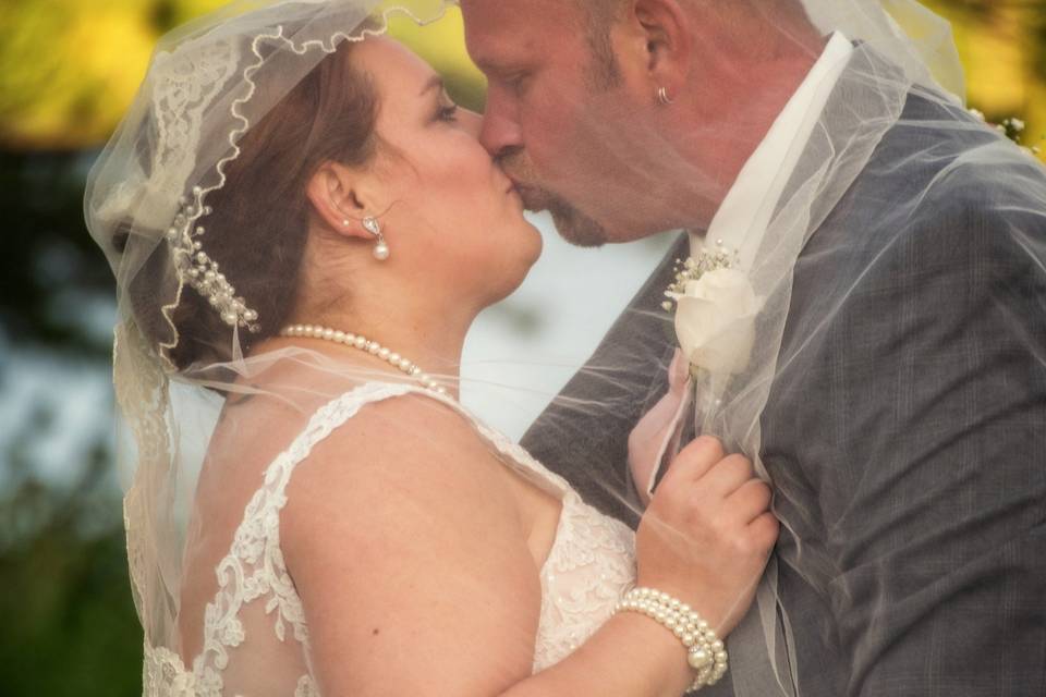 Newlyweds kiss - James R Byrd Photography