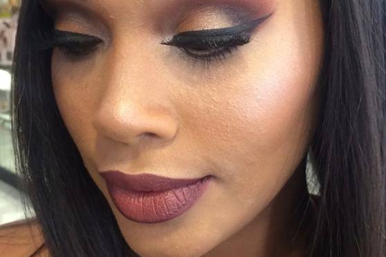 Strong eye makeup and bold lip