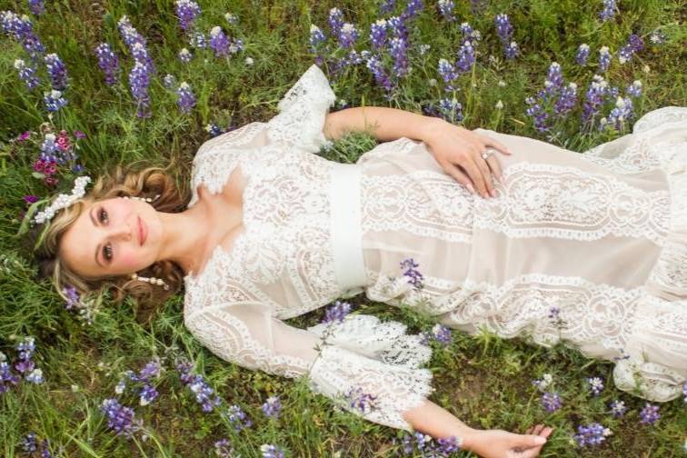 Bride in a field of violets