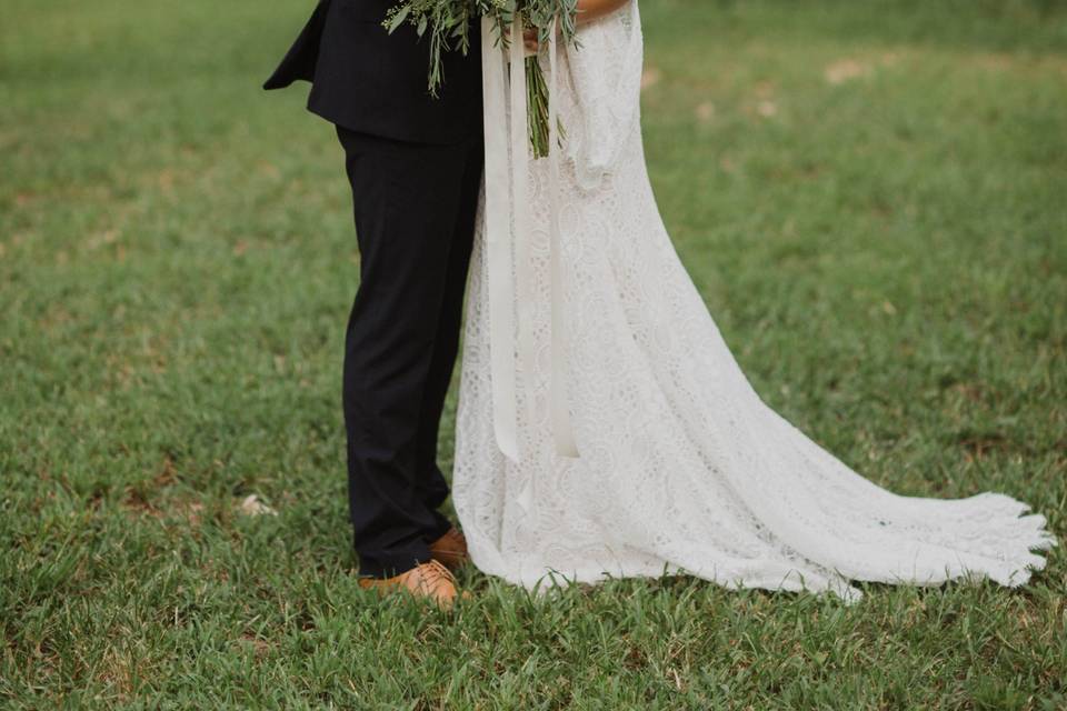 Bride and groom with bouquet