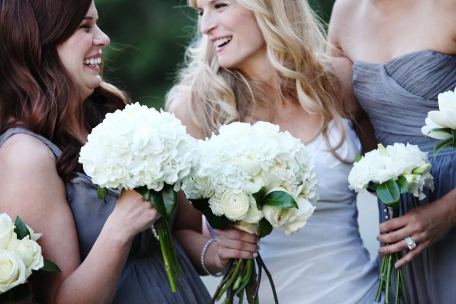 Bridesmaids holding bouquet