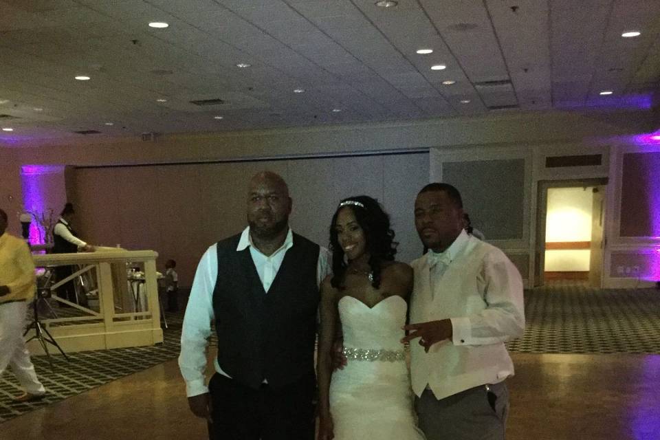 Groom and bride with the DJ