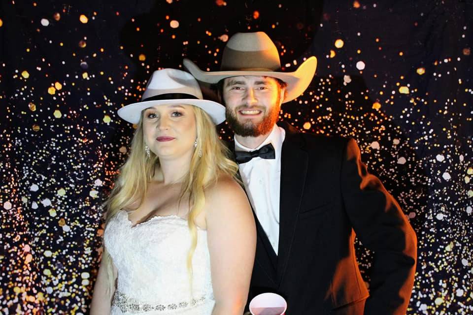 Newlyweds and cowboy props