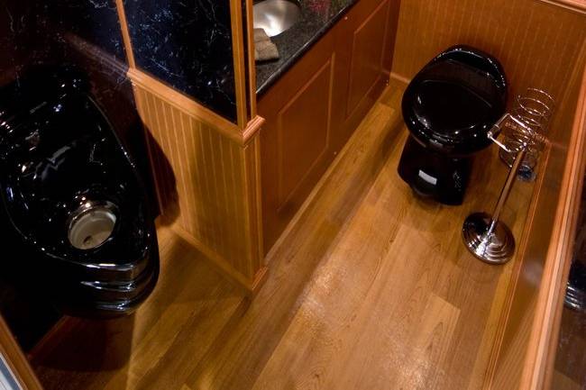 http://www.servicesanitation.com/regal-2-stall-luxury-restroom-trailer