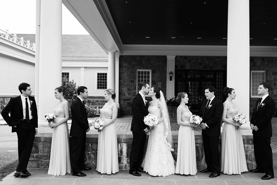 Newlyweds, bridesmaids, and groomsmen