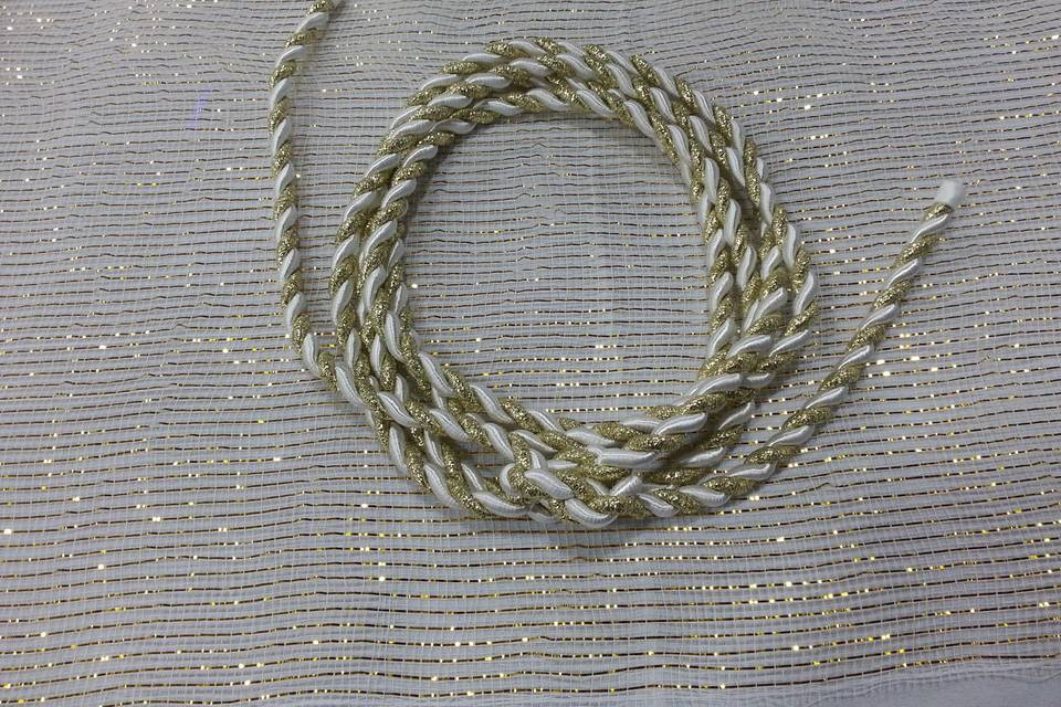 Gold/White Handfasting Cord from military ceremony, after the knot was tied.