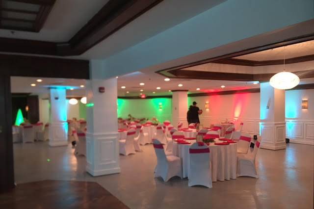 You will notice the wood flooring then the concrete designed with a light grey overlay then with a gloss clear coat to give the color of the Wedding or Event a neutral base so that colors and up lighting pop.