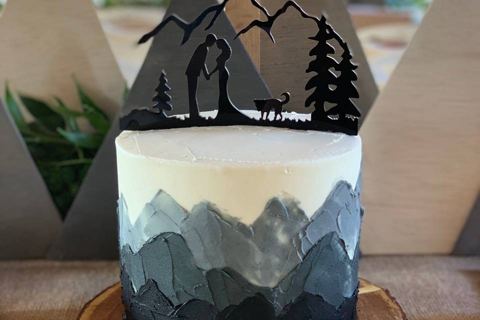 Palette mountains cutting cake