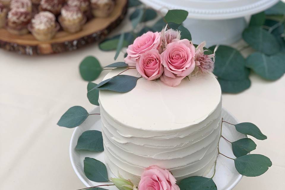 Cutting cake with mini cupcake