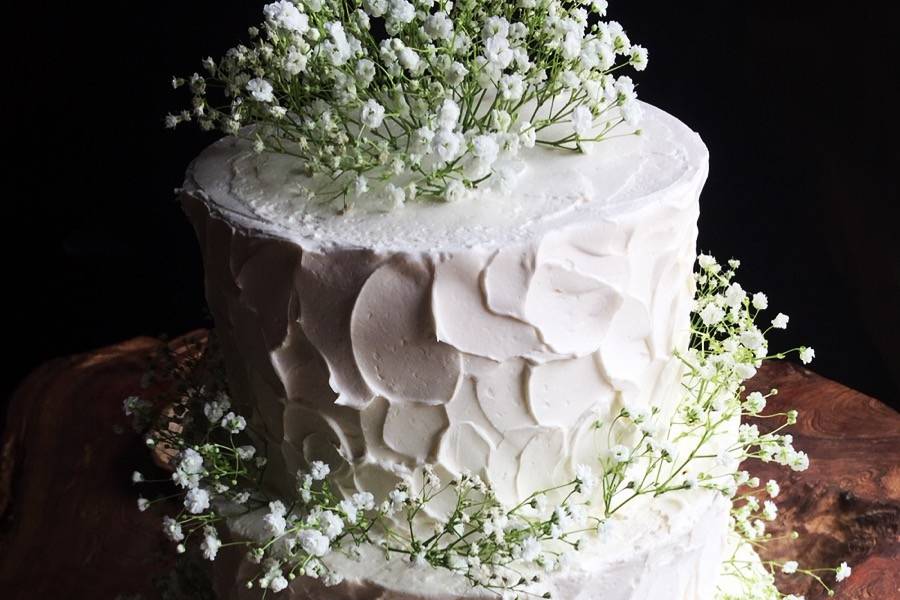 Cutting cake with mini cupcake