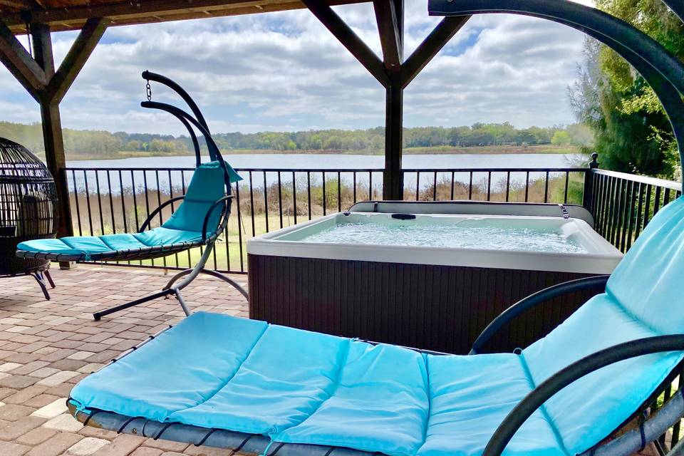 Hot tub and lounge chairs