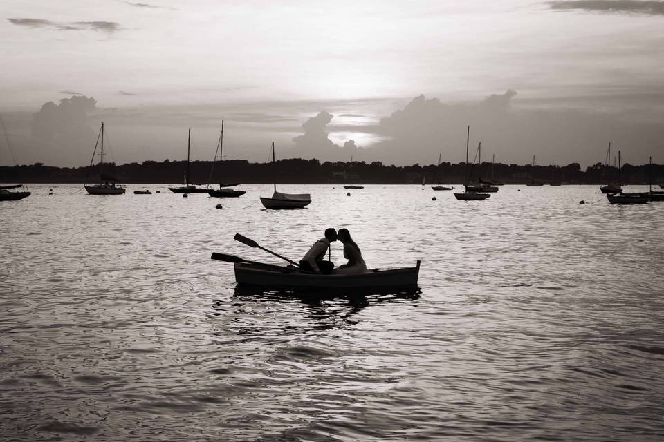 Couple in Rowboat on the Ocean
