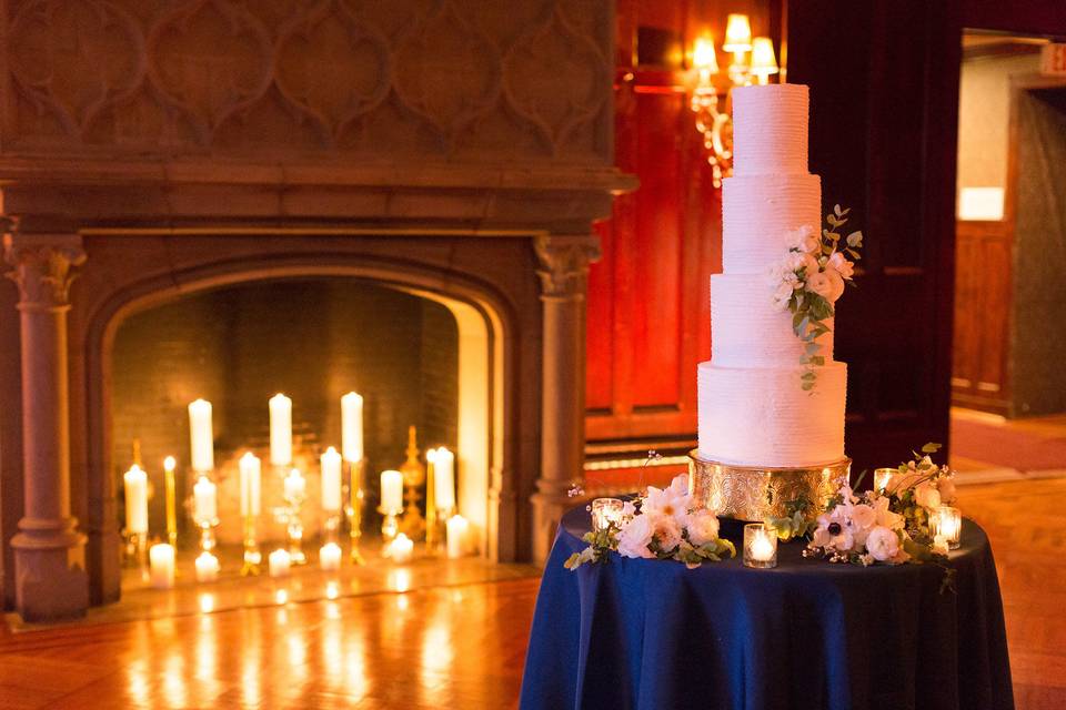 Wedding cake before a fireplace