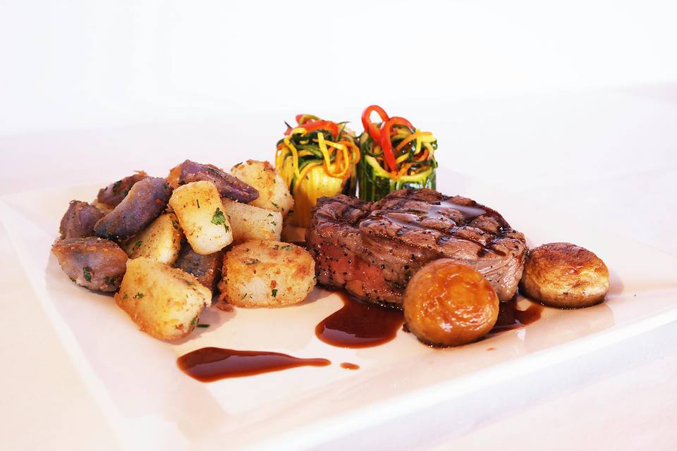 Filet mignon with roasted potatoes and zucchini