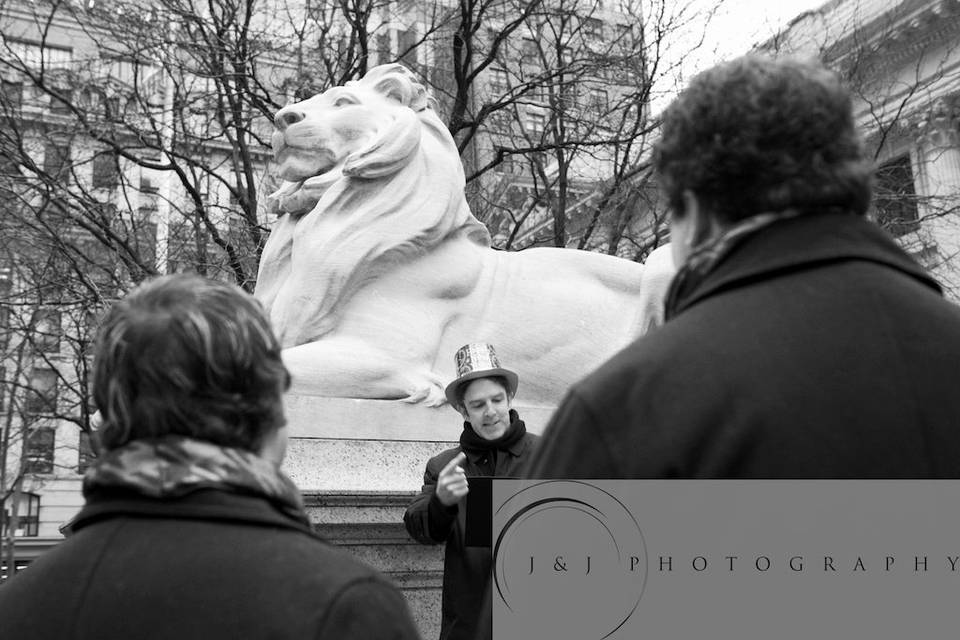 I led Trevor & Evan on a 'Wedding Walking Tour', with stops at the New York Public Library, Bryant Park, 5th Avenue, and Rockefeller Center. We did each part of their ceremony at a different stop along the tour. At Rockefeller Center, we had a group of onlookers cheering.