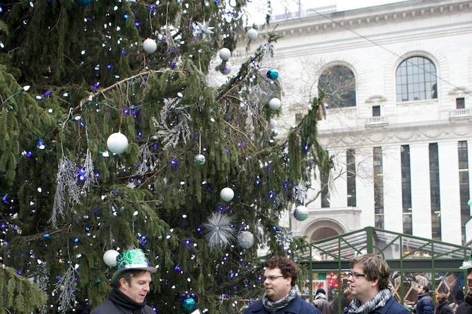 I led Trevor & Evan on a 'Wedding Walking Tour', with stops at the New York Public Library, Bryant Park, 5th Avenue, and Rockefeller Center. We did each part of their ceremony at a different stop along the tour. At Rockefeller Center, we had a group of onlookers cheering.