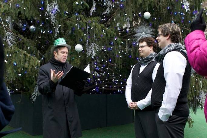 I led Trevor & Evan on a 'Wedding Walking Tour', with stops at the New York Public Library, Bryant Park, 5th Avenue, and Rockefeller Center. We did each part of their ceremony at a different stop along the tour. At Rockefeller Center, we had a group of onlookers cheering.