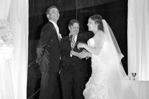 Tom and Samantha sharing a laugh during their ceremony