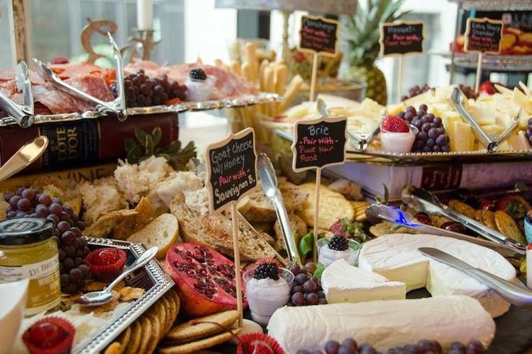 Grazing table with premium cheeses and more