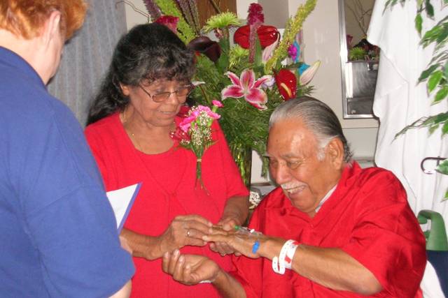 A hospital is not the usual setting for a wedding buy it is what they wanted.  Nearby patients shared their flowers and nurses witnessed the ceremony.