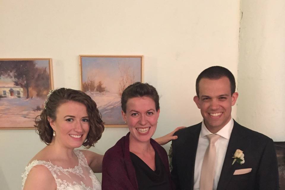 Newlyweds and the officiant