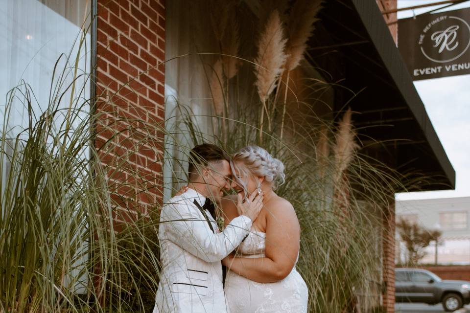 Bride and Groom Front of Venue