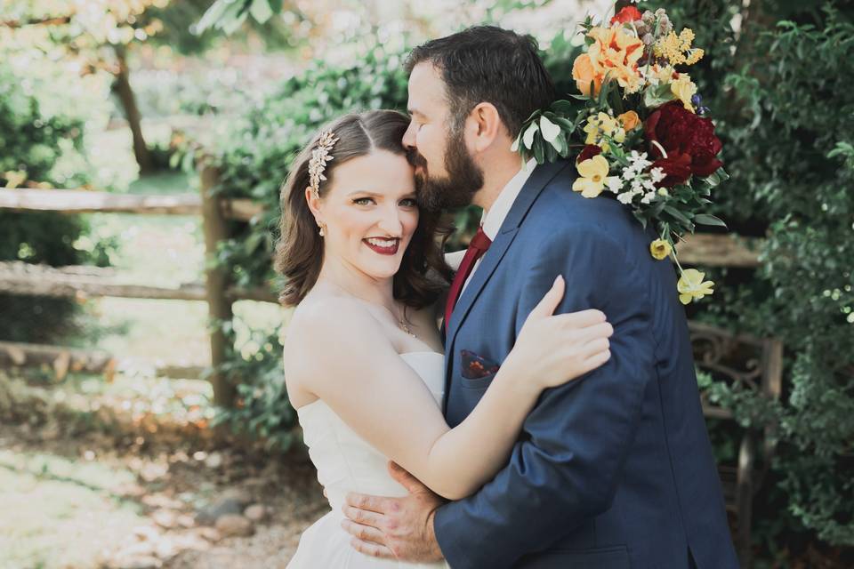 Bride and Groom in Greenery