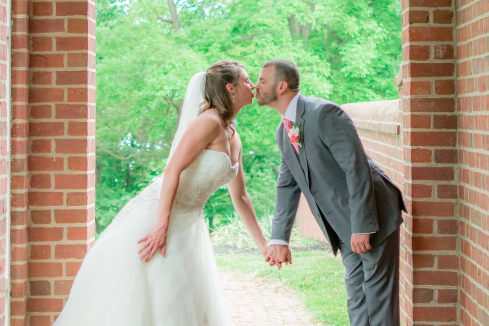 Newlyweds exchanging a romantic gesture