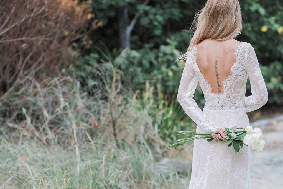 Backless dress with long trail