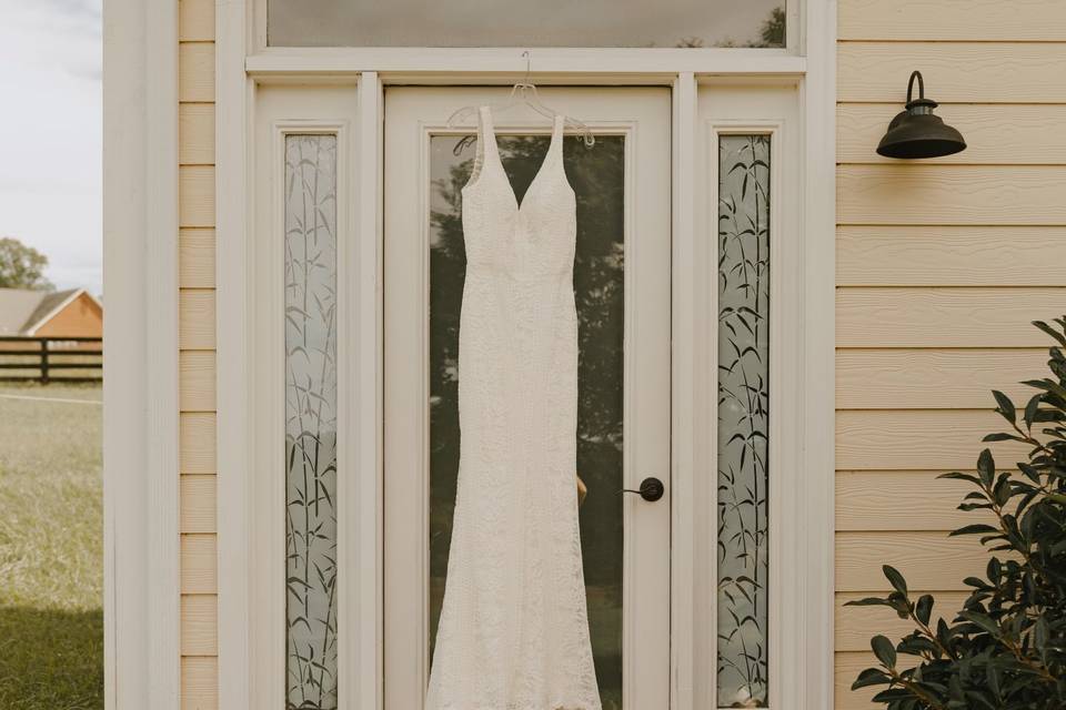 Wedding dress hanging up