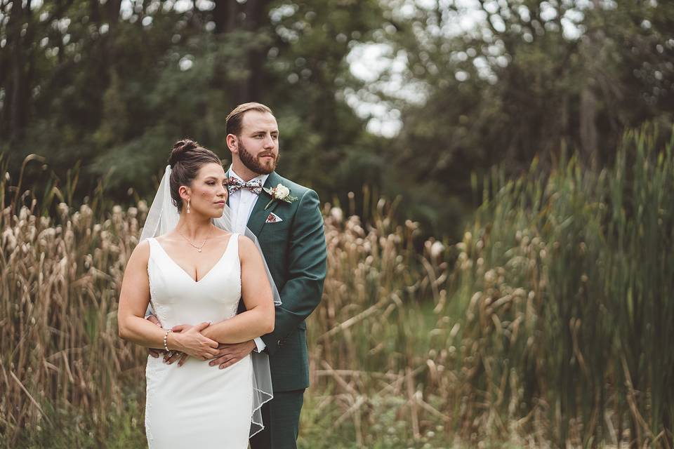 Couple in front of a pond