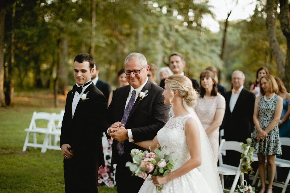 Father giving away bride