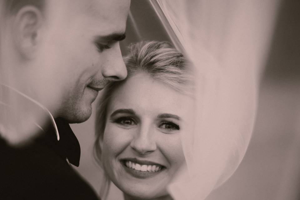 Under the veil with couple