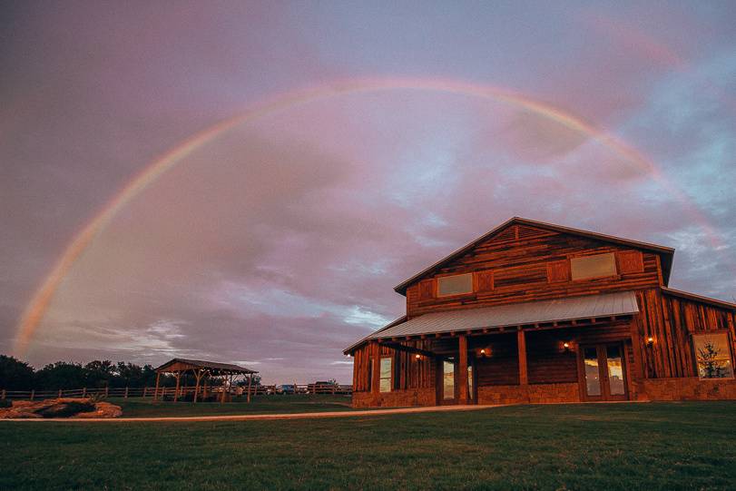 Rainbow over wedding venue