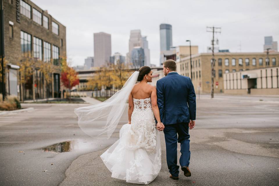 Couple leisurely walk hand in hand​