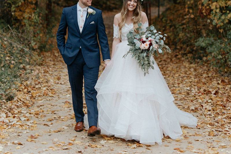 Couple leisurely walk hand in hand​