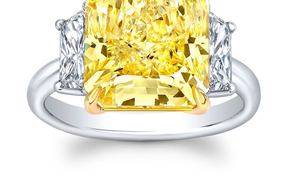 One of a kind Fancy Yellow Diamond Radiant Diamond Ring.