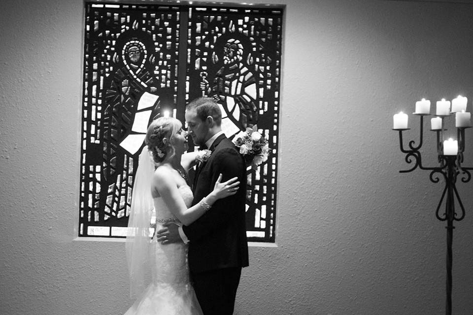 Newlyweds kissing