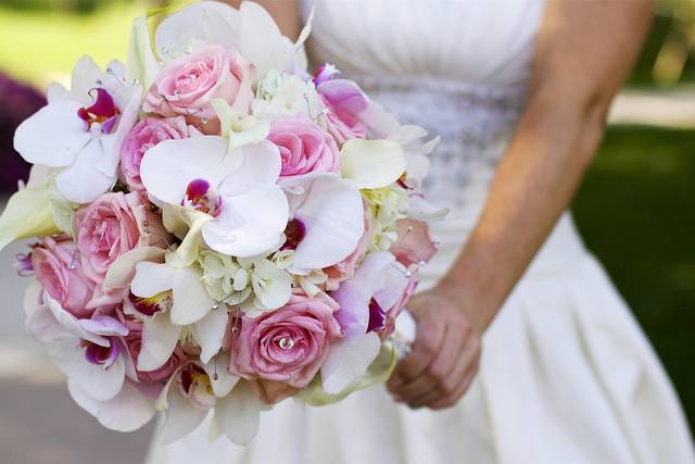 Bridal Bouquet creative with roses, hydrangea, mini callas, phalaenopsis orchids.  Designed by Bill Hattel Wh Designs Floral Events.