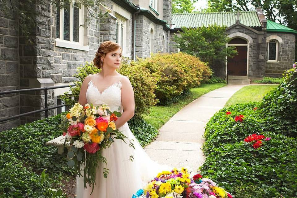 Bride holding a colorful bouquet