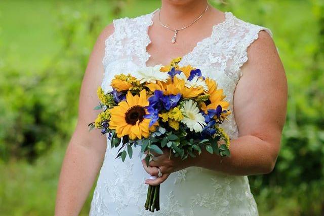 Bride holding a summer bouquet