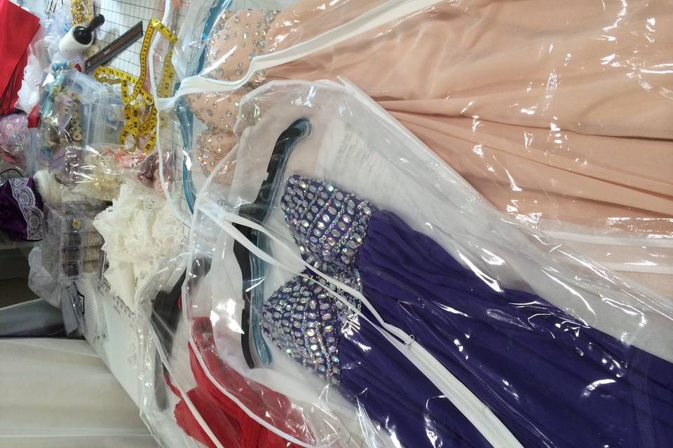 An array of prom and bridesmaid dresses altered at Sewing by Linda!