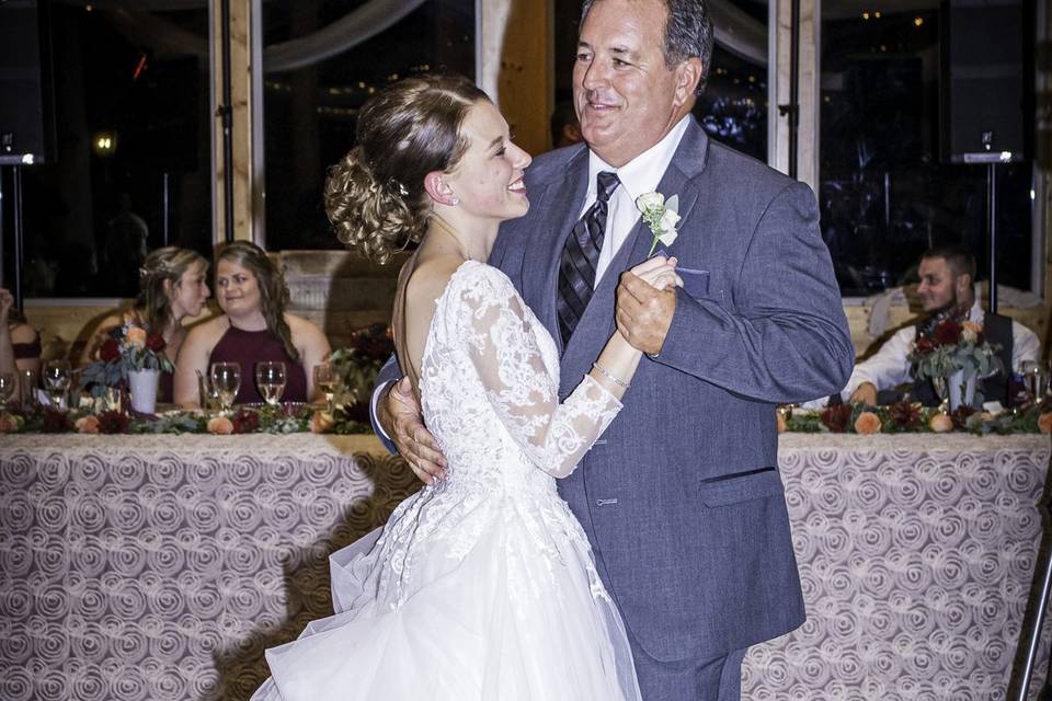 Father and daughter dance.