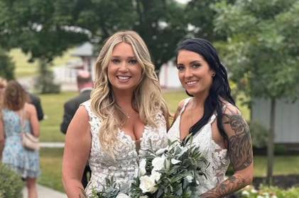 2 brides in their dress!