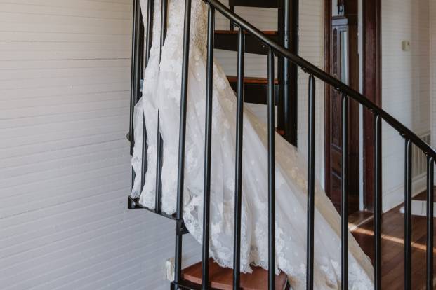 Bride on Staircase w bouquet