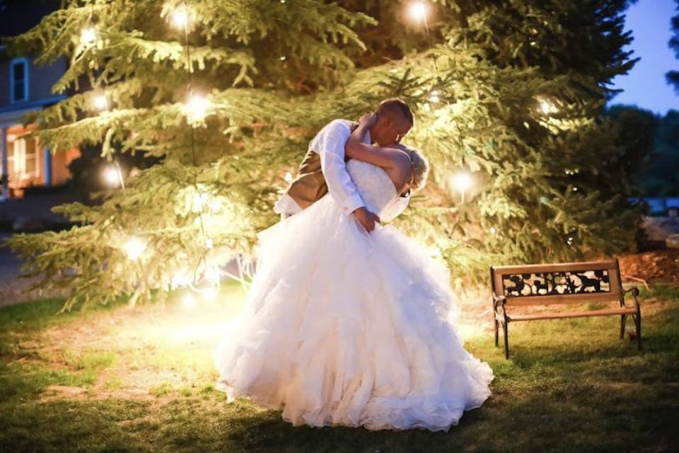 Bride and Groom by tree