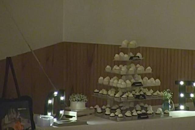 Wedding cake and cupcakes