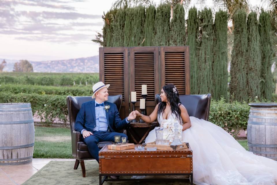 Newlyweds sitting outside