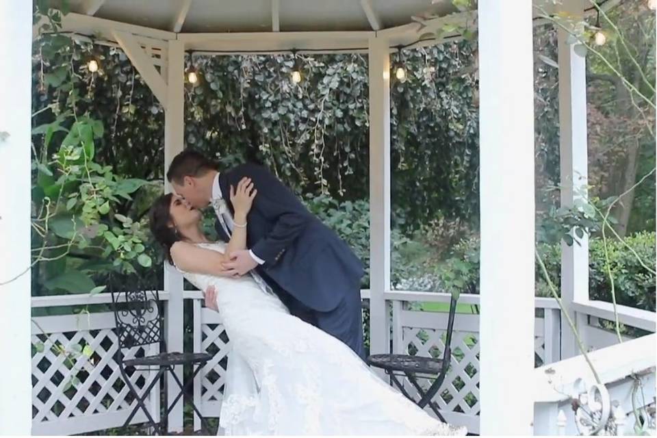 Kissing in a gazebo